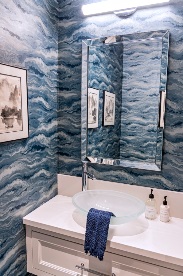 custom powder room with blue ocean design wallpaper